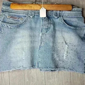 Vanilla Star denim skirt with bead work and minir distressing. Size 7